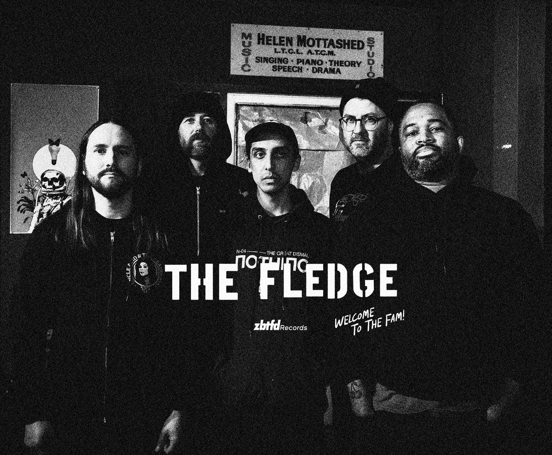 grainy black and white photograph of the band